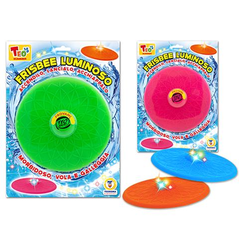 Bambino che lancia il Teo's Frisbee con Luci LED al parco